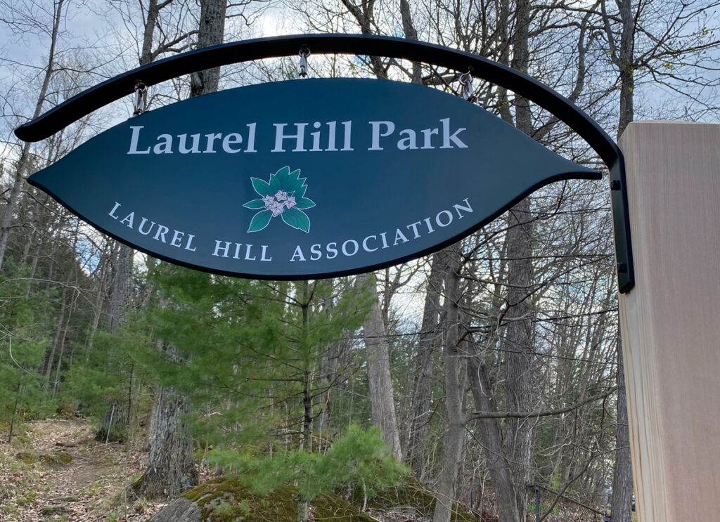 Laurel Hill Association's new signs have been installed at a number of their properties around town.