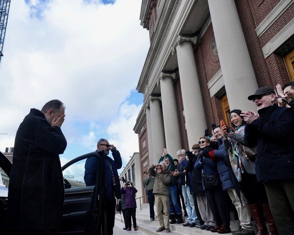 Andris Nelsons greeted by BSO Orchestra March 17     Courtesy of The Boston Globe