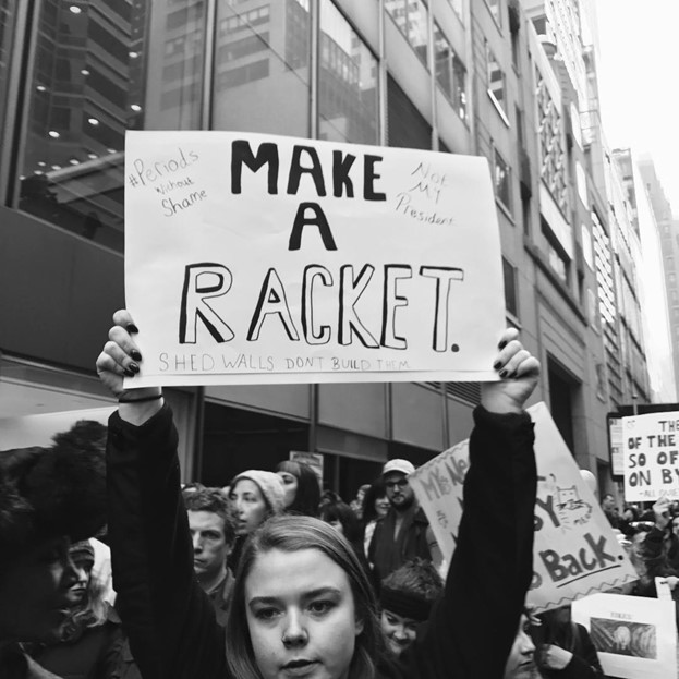 Photo: Lionel Delevingne - girl hodling "make a racket" sign